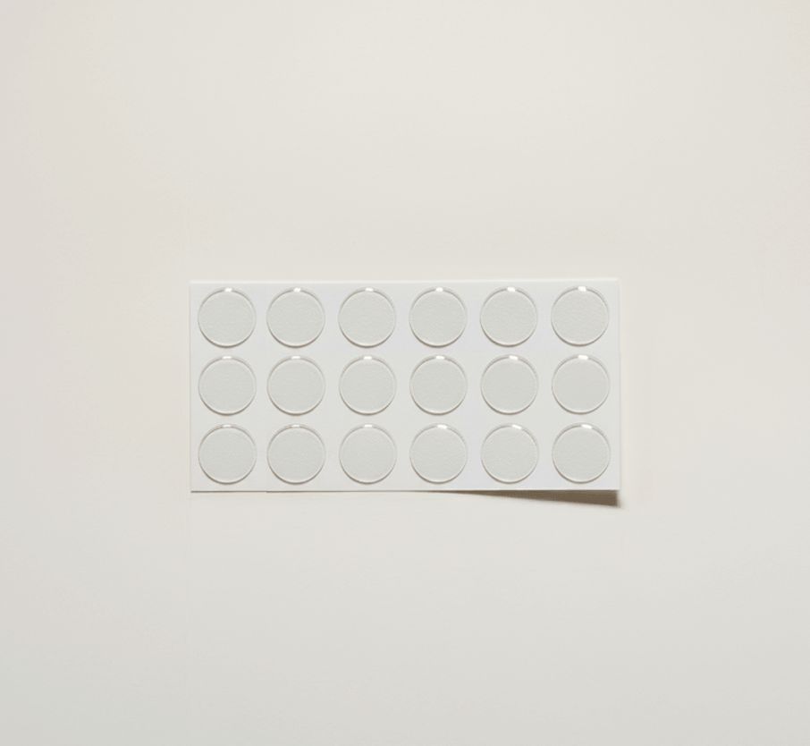Extra adhesive dots