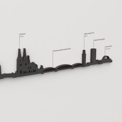 Decoración de pared con la silueta del skyline de Köln color negro.