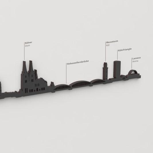 Decoración de pared con la silueta del skyline de Köln color negro.