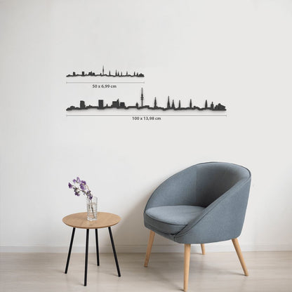 Comparativa de tamaños 50 cm y 100 cm de la silueta de Hamburgo en una pared de salón.