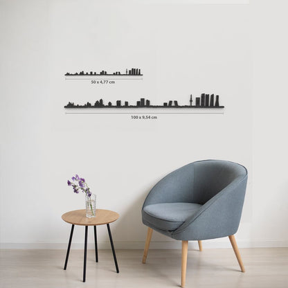 Comparativa 50 cm vs 100 cm del skyline Madrid en salón.