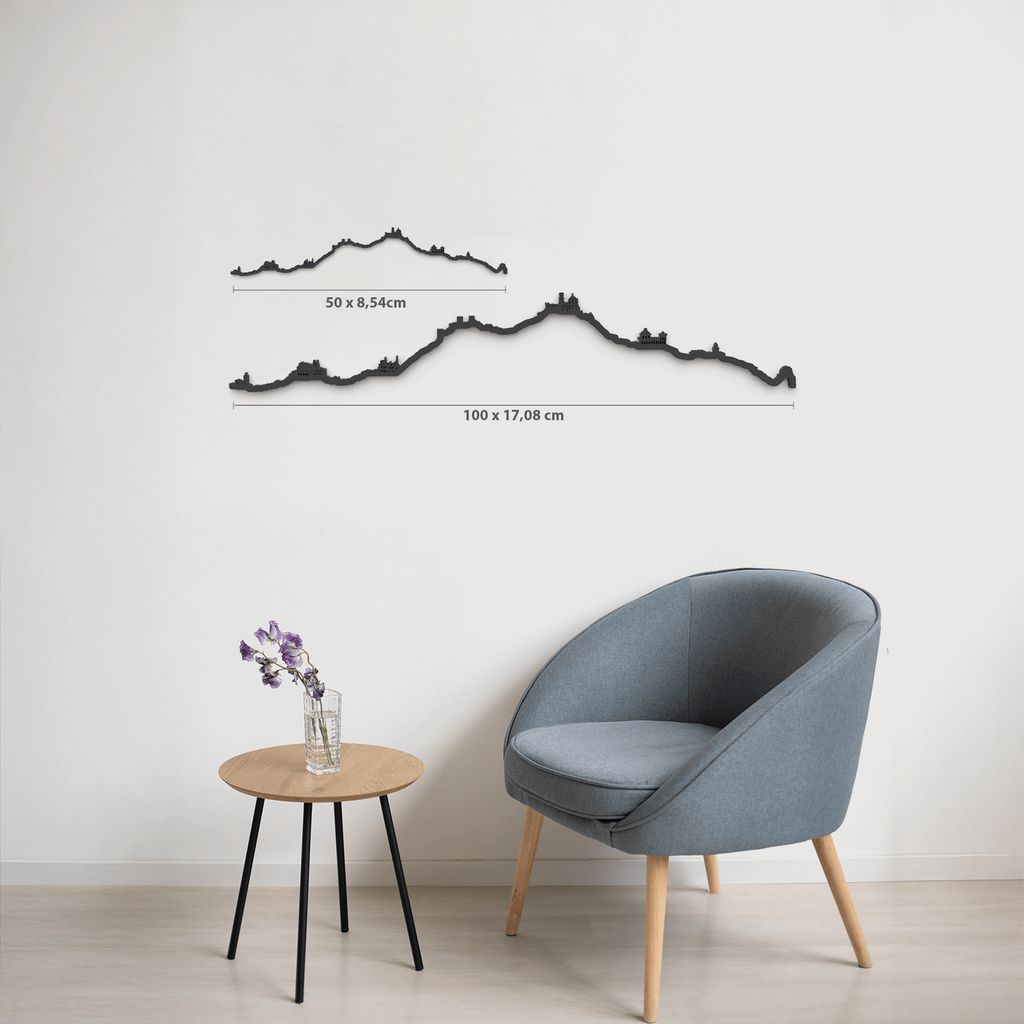 Comparativa de tamaños 50 cm y 100 cm de la silueta de Sintra en una pared de salón.