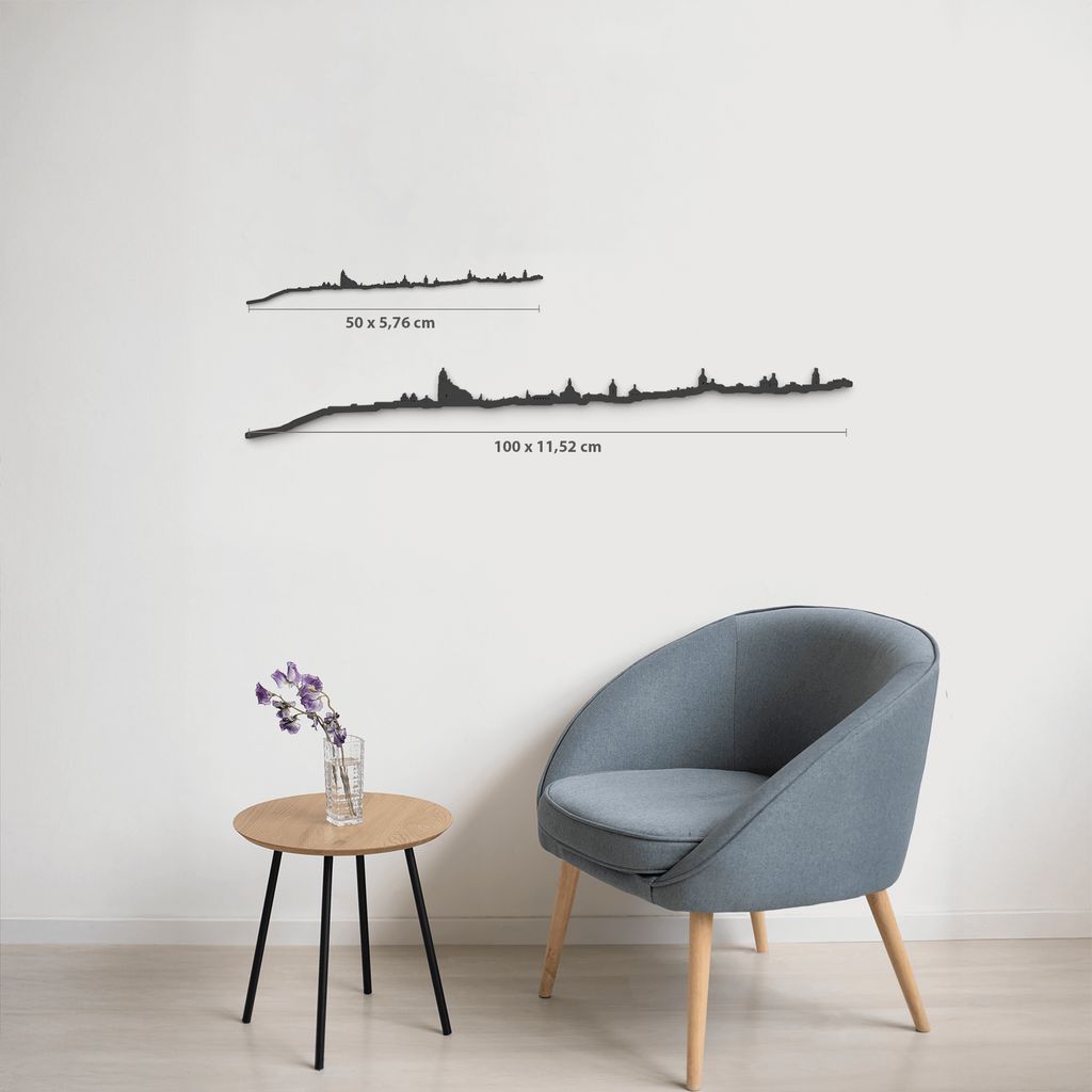 Comparativa de tamaños 50 cm y 100 cm de la silueta de Úbeda en una pared de salón.