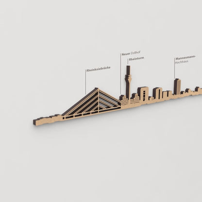 Skyline Dusseldorf – detalle de Neuer Zollhof en madera marrón.