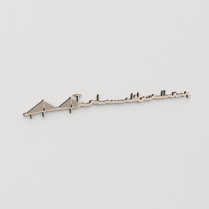 Idea de regalo original: la silueta del skyline de Cádiz en madera natural.