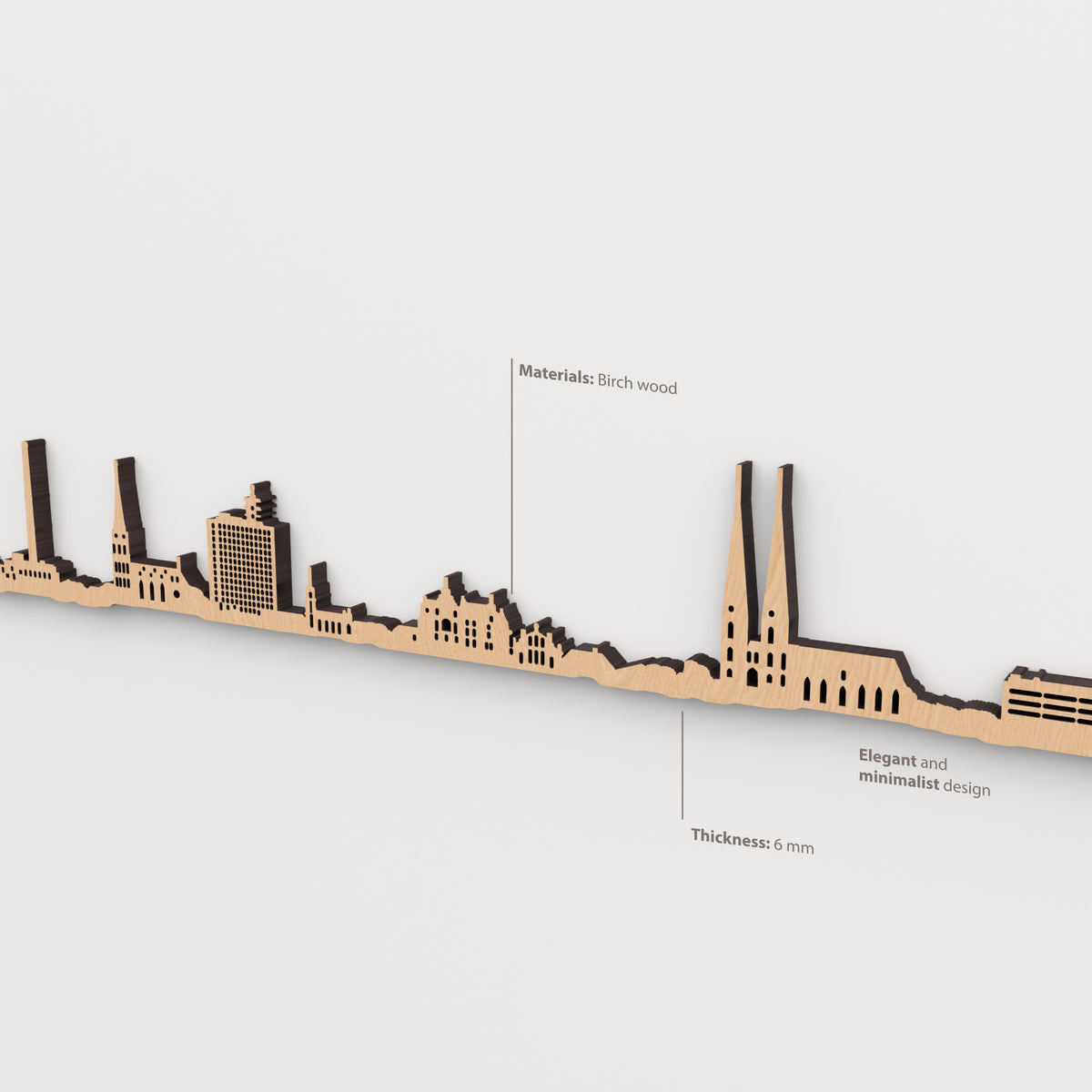 Detalle del skyline de Bielefeld en acabado marrón, con indicaciones de madera de abedul y grosor de 6 mm.