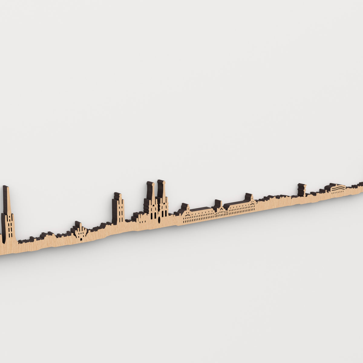 Detalle del skyline de Burdeos en acabado marrón, con ventanas recortadas y relieve de madera.