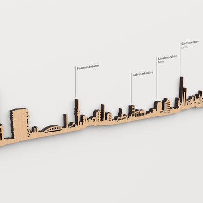 Skyline de Duisburg en acabado marrón con nombres de Fernmeldeturm, Salvatorkirche, Landesarchiv NRW, Stadtwerke- turm.