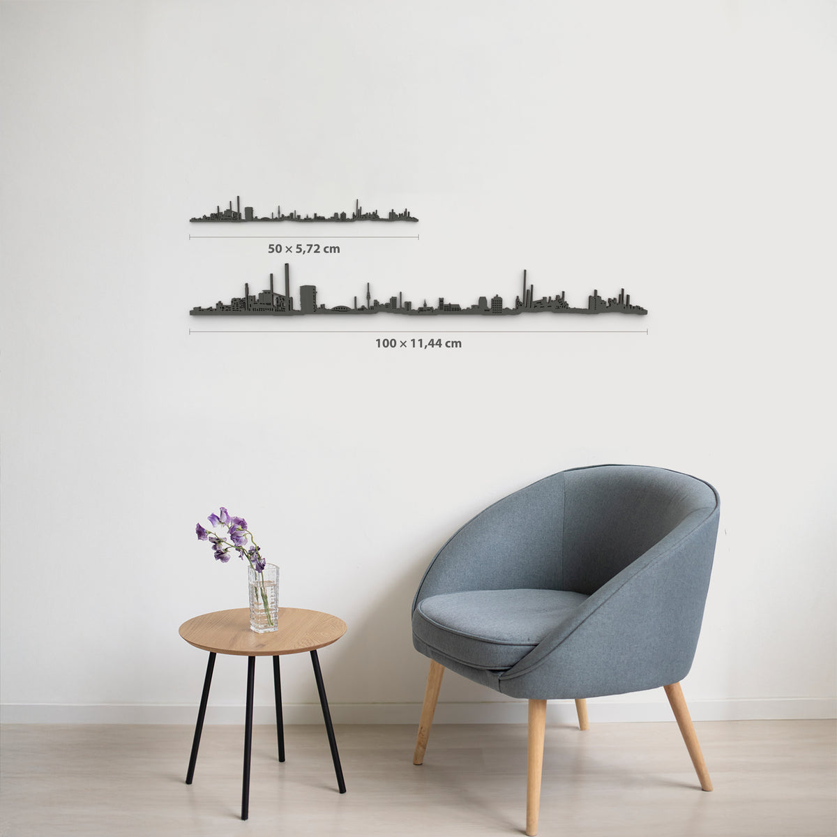 Comparativa de tamaños del skyline de Duisburg en acabado negro: 50 cm y 100 cm de ancho, con alturas proporcionales y grosor de 6 mm.