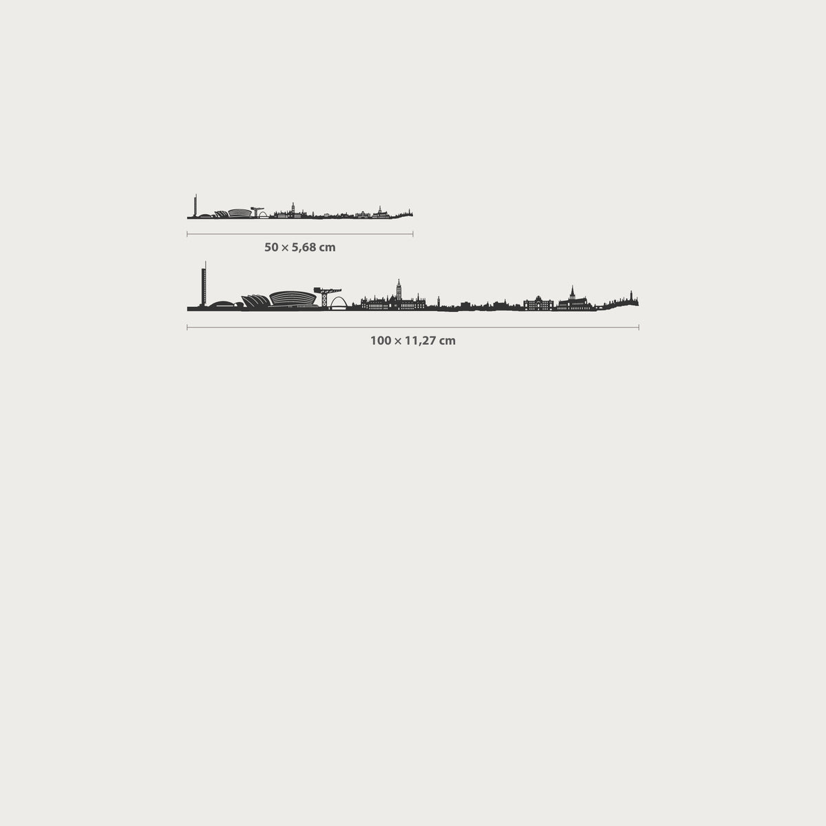 Medidas del skyline de Glasgow en acabado negro: 50 × 5,68 cm y 100 × 11,27 cm, dibujadas con los diseños originales de cada tamaño.