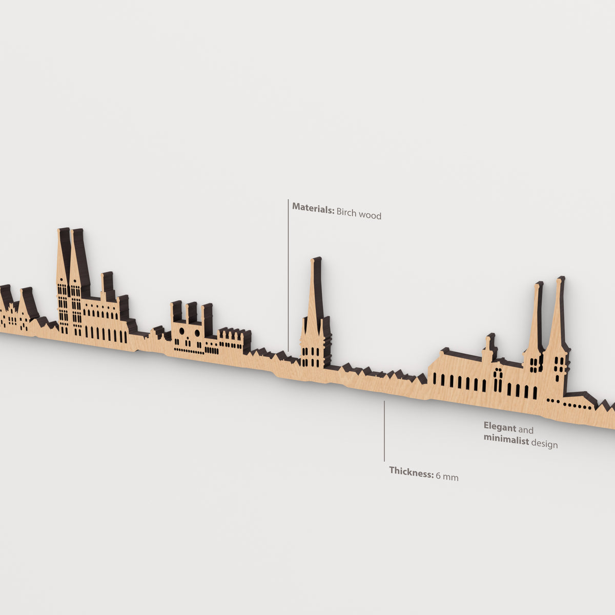 Detalle del skyline de Lübeck en acabado marrón, con indicaciones de madera de abedul y grosor de 6 mm.