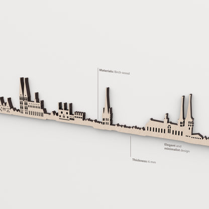 Detalle del skyline de Lübeck en acabado natural, con indicaciones de madera de abedul y grosor de 6 mm.