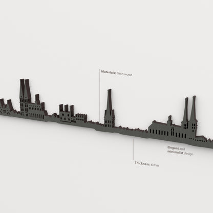 Detalle del skyline de Lübeck en acabado negro, con indicaciones de madera de abedul y grosor de 6 mm.