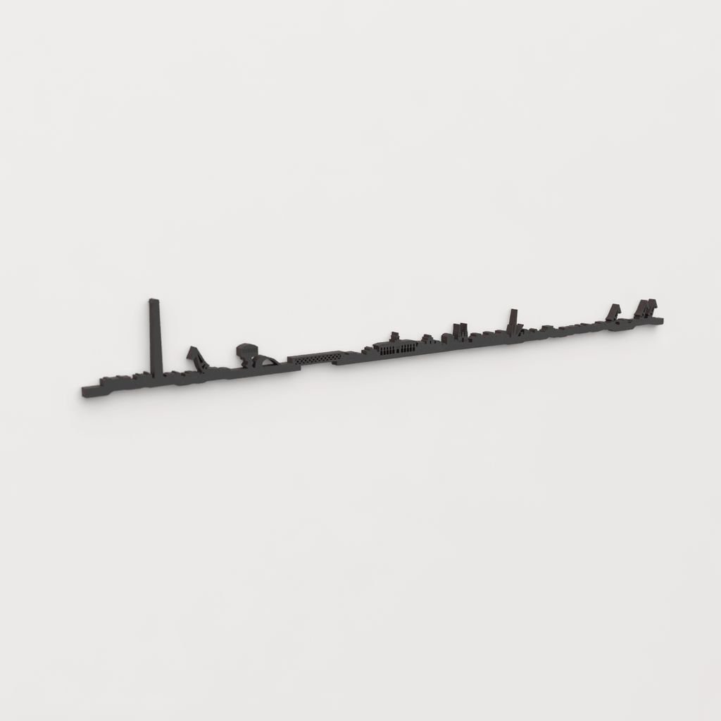 Vista en perspectiva de la silueta del skyline de Avilés en madera negra.