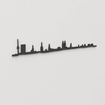 Vista en perspectiva de la silueta del skyline de Bremen en madera negra.