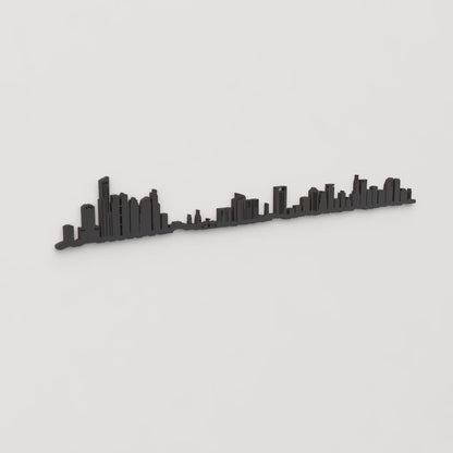 Vista en perspectiva de la silueta del skyline de Buenos Aires en madera negra.