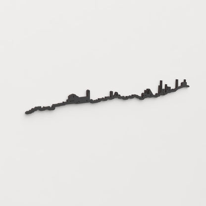 Perspectiva lateral del skyline Linares en madera negra.