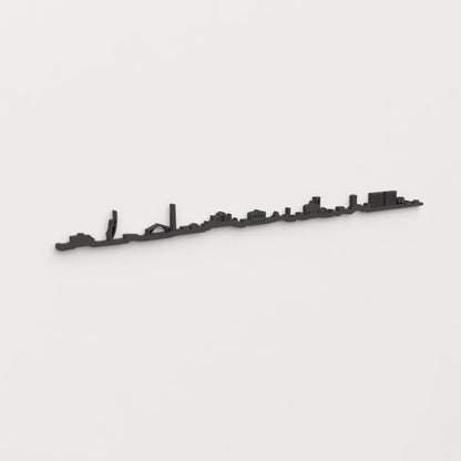 Perspectiva lateral del skyline Mataró en madera negra.