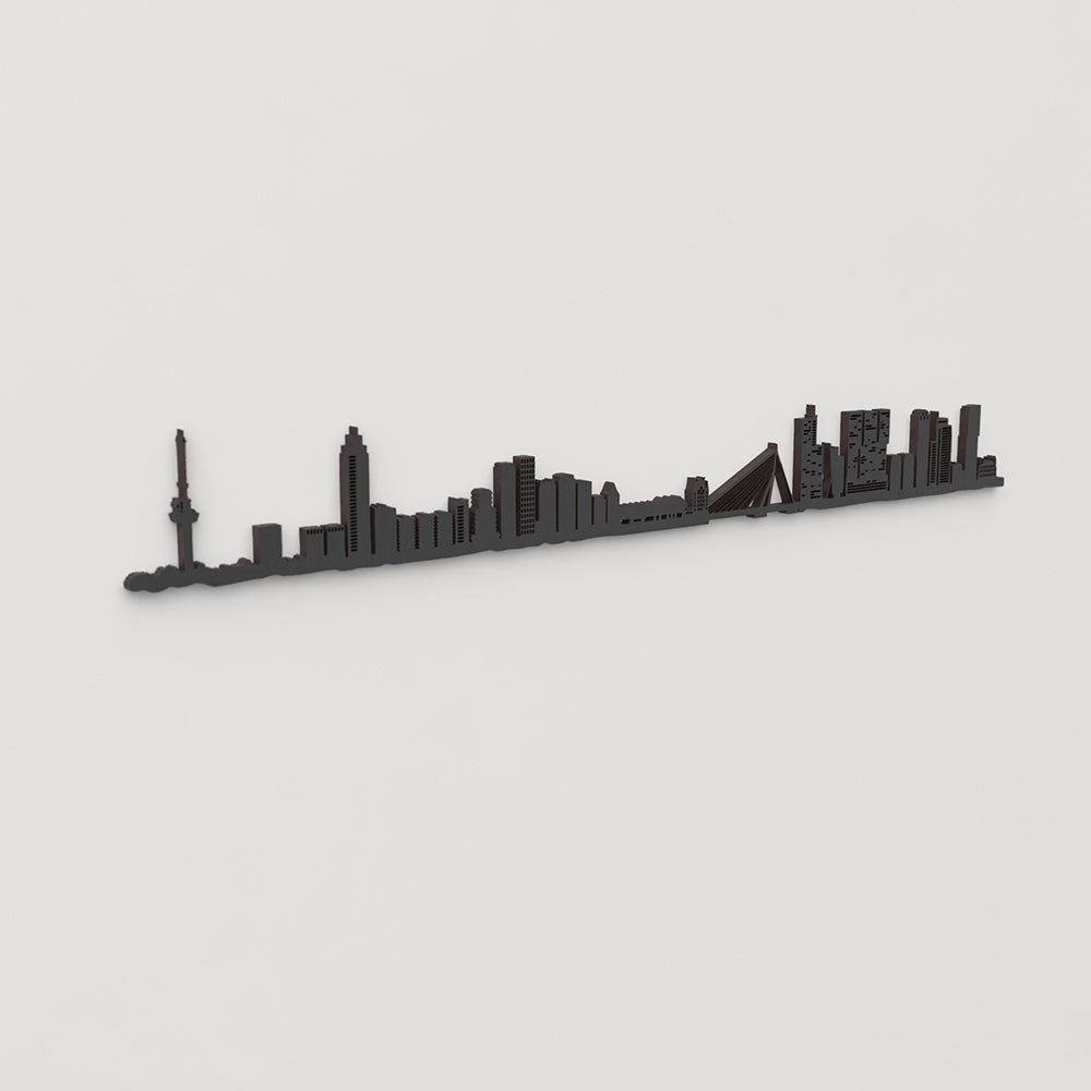Vista en perspectiva de la silueta del skyline de Rotterdam en madera negra.
