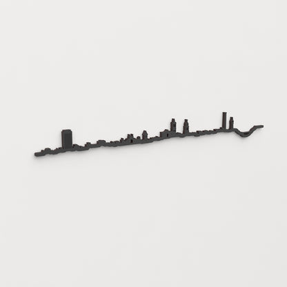 Perspectiva lateral del skyline Sabadell en madera negra.